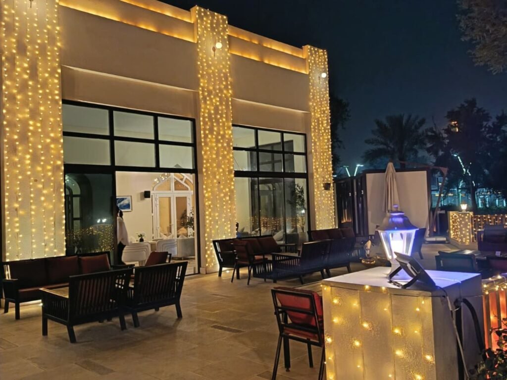 modern venue exterior illuminated with vertical curtain lights and architectural led accent lighting